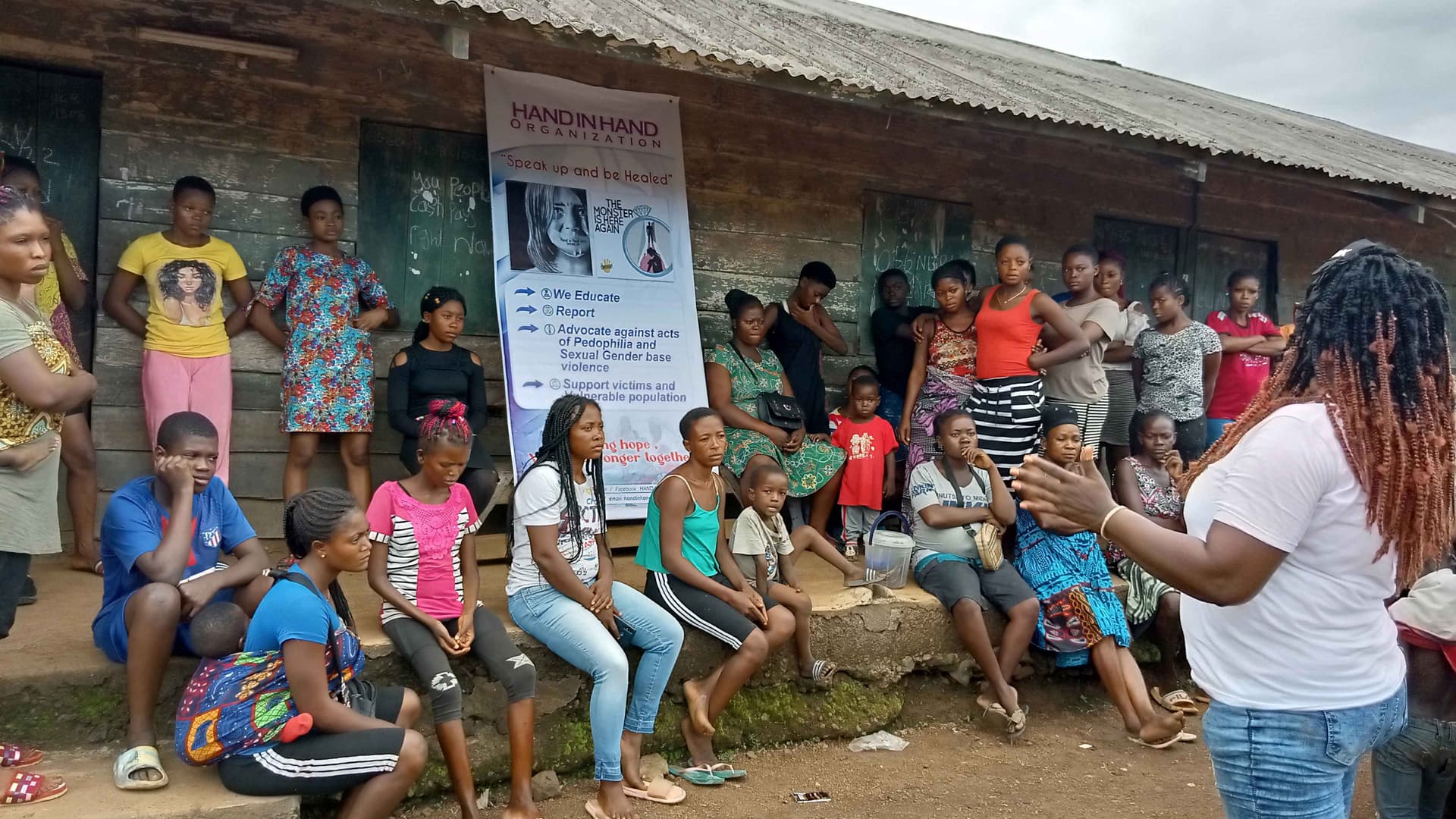 Photo of young girls and women receiving lectures on menstrual hygiene
